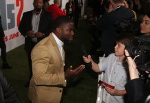 Kevin Hart’s Funny AF Is Coming Back: What Season 2 Will Look Like Kevin Hart, Black comedian, smiling on a red carpet