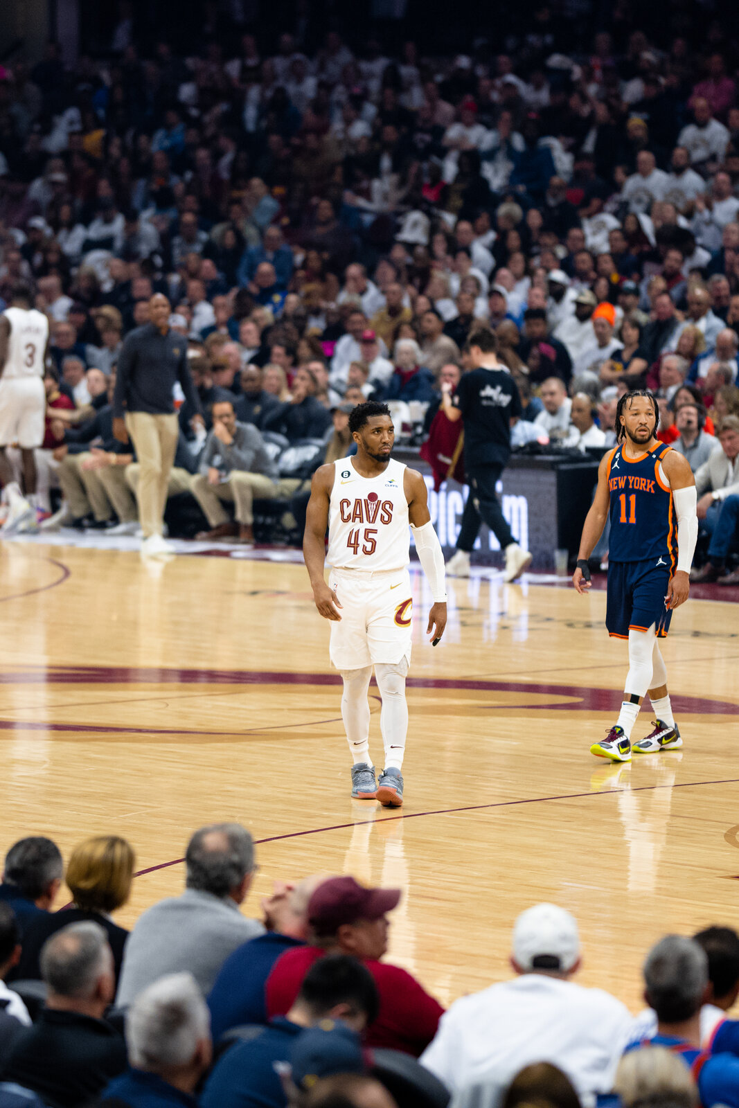 Donovan Mitchell and a fellow NBA guard on the court during a game
