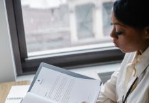 Black Founders Raised $643 Million in Early 2026 — the Best Quarter Since 2022. Here Is the Catch A Black entrepreneur reviewing business documents at a desk