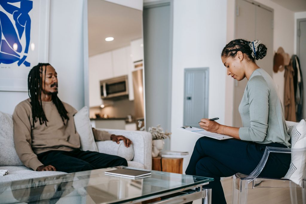 Black man in a therapy and counseling session