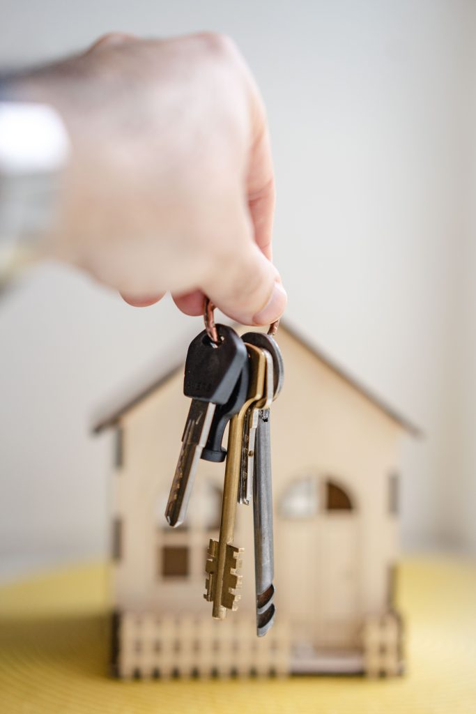 A set of house keys handed over during a home purchase.