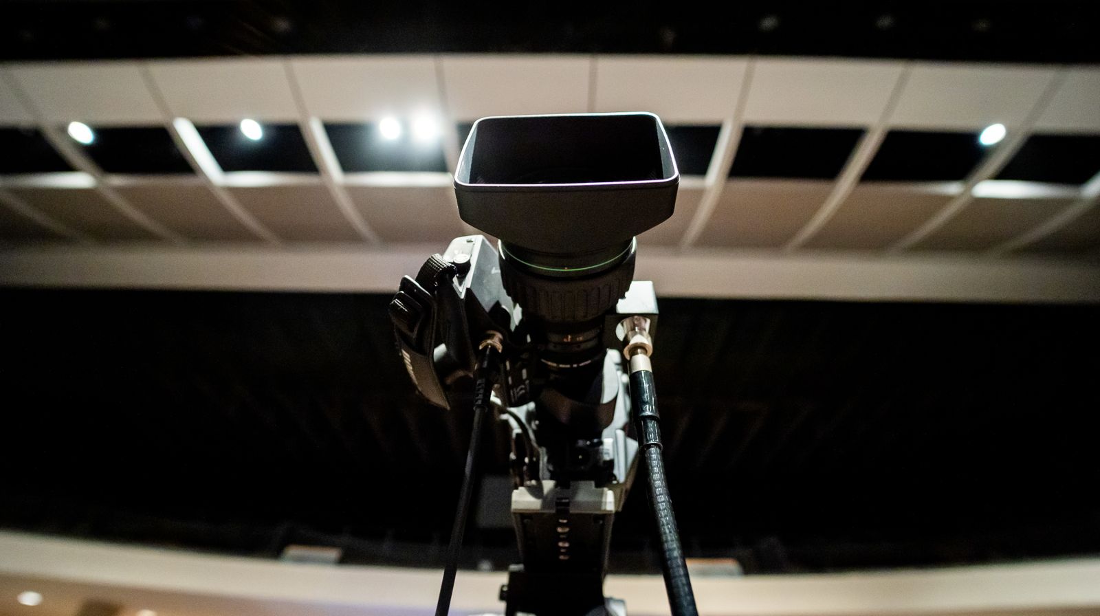 A television camera set up on a studio stage