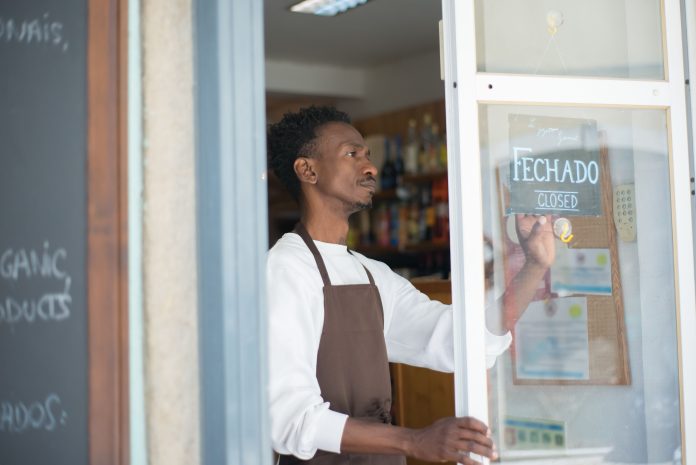Black business owner at his shop