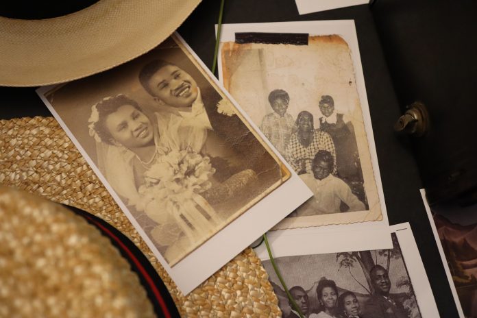 Vintage family photographs, symbolizing a century of Black history commemoration and remembrance